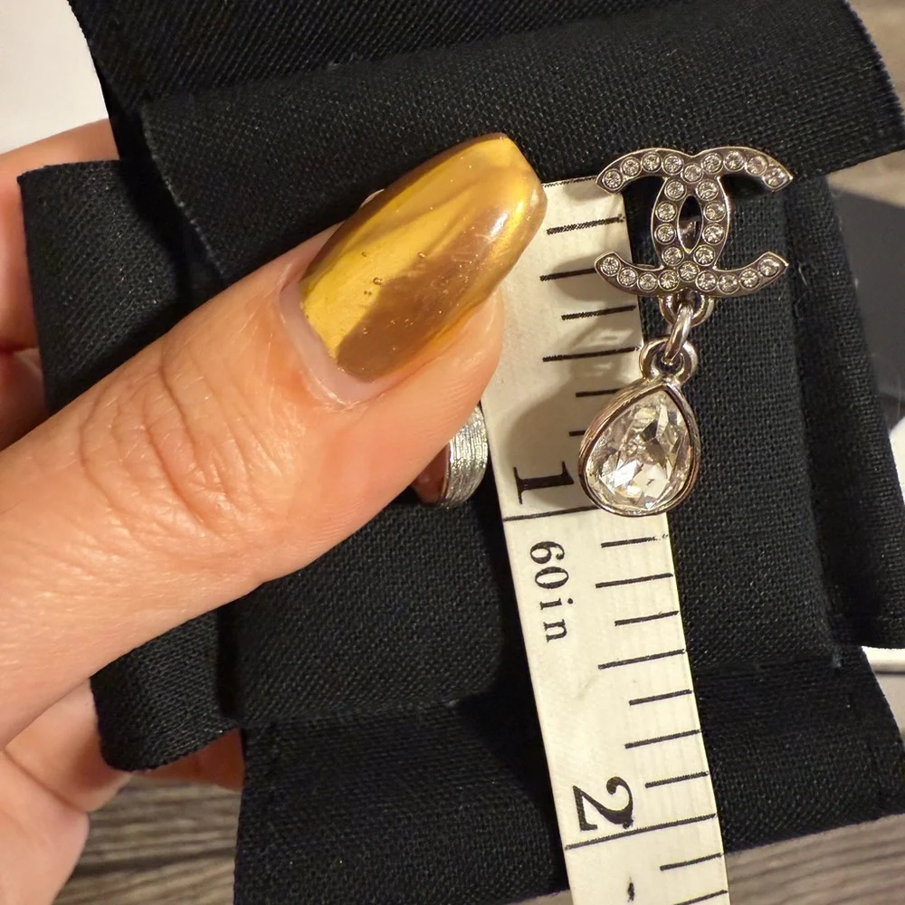 CHANEL Silver Crystal CC Teardrop Dangle Clip On Earrings